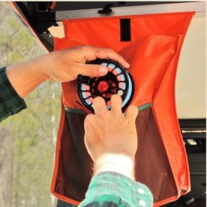 Velcro shoe bags that hang from the tents.