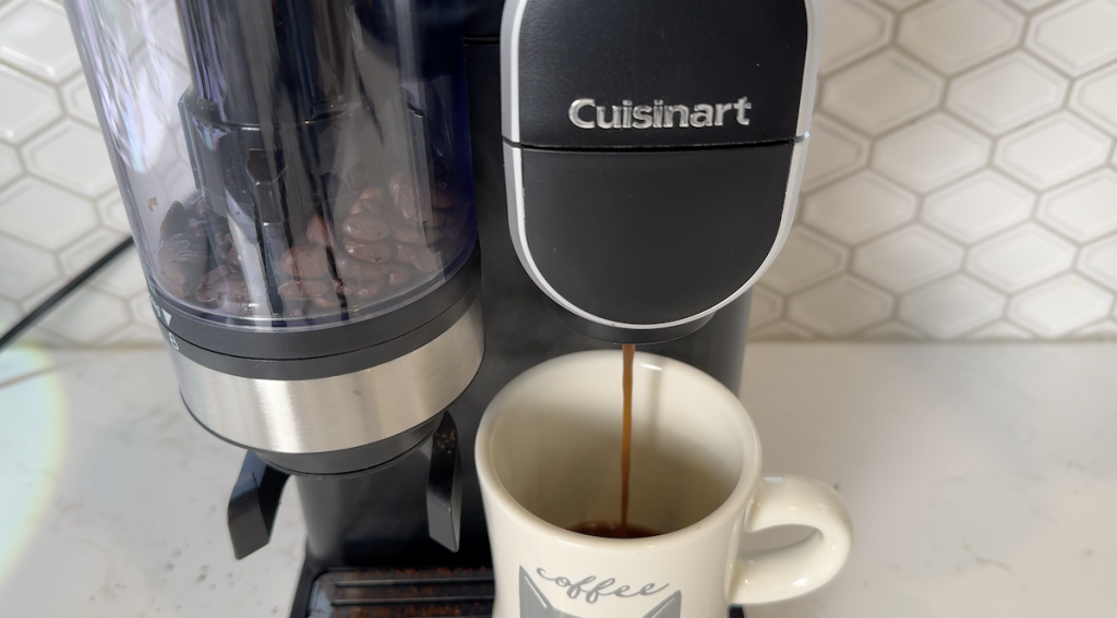 Close up of coffee brewing using fresh ground beans.