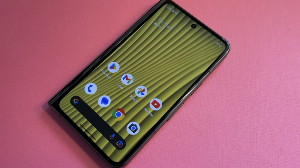 Google Pixel fold on pink background.