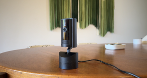 Ring pan Tilt Indoor Cam sitting on table.
