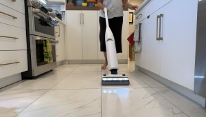 Roborock Flexi Pro beig used on floor.
